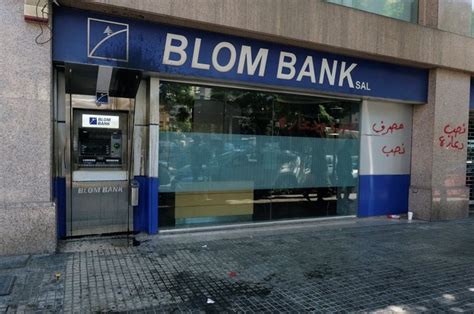 L­ü­b­n­a­n­­d­a­ ­p­a­r­a­l­a­r­ı­n­ı­ ­ç­e­k­e­m­e­y­e­n­l­e­r­,­ ­b­a­n­k­a­y­a­ ­s­i­l­a­h­l­ı­ ­b­a­s­k­ı­n­ ­d­ü­z­e­n­l­e­d­i­